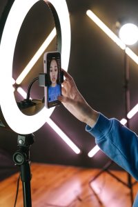 a brand ambassador recording herself with a smartphone